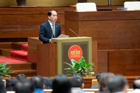 Ủy viên Ủy ban Thường vụ Quốc hội Hoàng Thanh Tùng trình bày Báo cáo thẩm tra dự án Luật trong phiên toàn thể tại Kỳ họp thứ 10 Quốc hội khóa XV. (Nguồn QUOCHOI.VN)