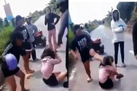 Nhóm người hành hung bé N. (Ảnh cắt từ clip)