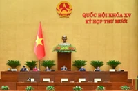 Bộ trưởng Nông nghiệp và Môi trường Trần Đức Thắng báo cáo tiếp thu, giải trình, chỉnh lý dự thảo Nghị quyết trước khi Quốc hội bấm nút thông qua. (Ảnh: DUY LINH)