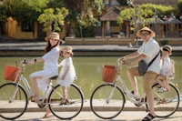 Hình ảnh gia đình sinh đủ 2 con đoạt Giải Nhì tại cuộc thi ảnh "Gia đình hai con- vẹn tròn hạnh phúc" do Chi cục Dân số Thành phố Hồ Chí Minh tổ chức. (Ảnh: Chi cục Dân số Thành phố Hồ Chí Minh)