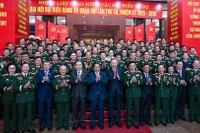 Tổng Bí thư Tô Lâm, Thủ tướng Phạm Minh Chính, Chủ tịch Quốc hội Trần Thanh Mẫn, Thường trực Ban Bí thư Trần Cẩm Tú cùng các đồng chí lãnh đạo Đảng, Nhà nước với các đại biểu dự Đại hội. 