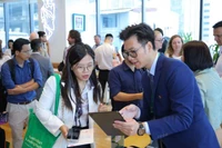 Các đại biểu trao đổi tại chương trình. (Ảnh: PV)