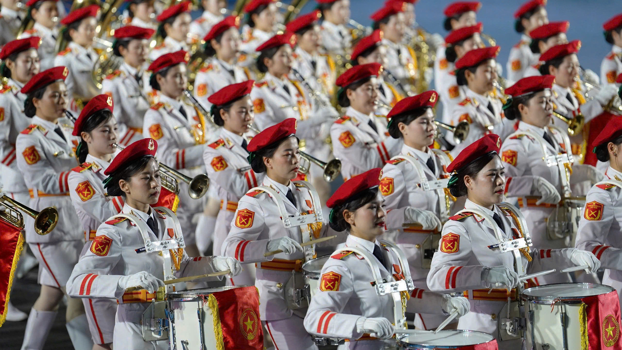 Đội hình nữ quân nhạc Quân đội Nhân dân Việt Nam trong buổi hợp luyện diễu binh, diễu hành. Đội hình nữ quân nhạc Quân đội Nhân dân Việt Nam trong buổi hợp luyện diễu binh, diễu hành.