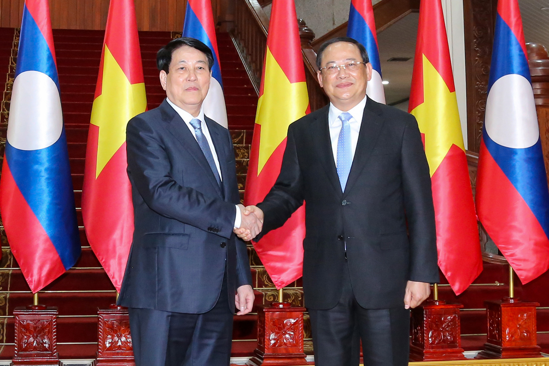 Chủ tịch nước Lương Cường và Thủ tướng Lào Sonexay Siphandone tại hội kiến.
