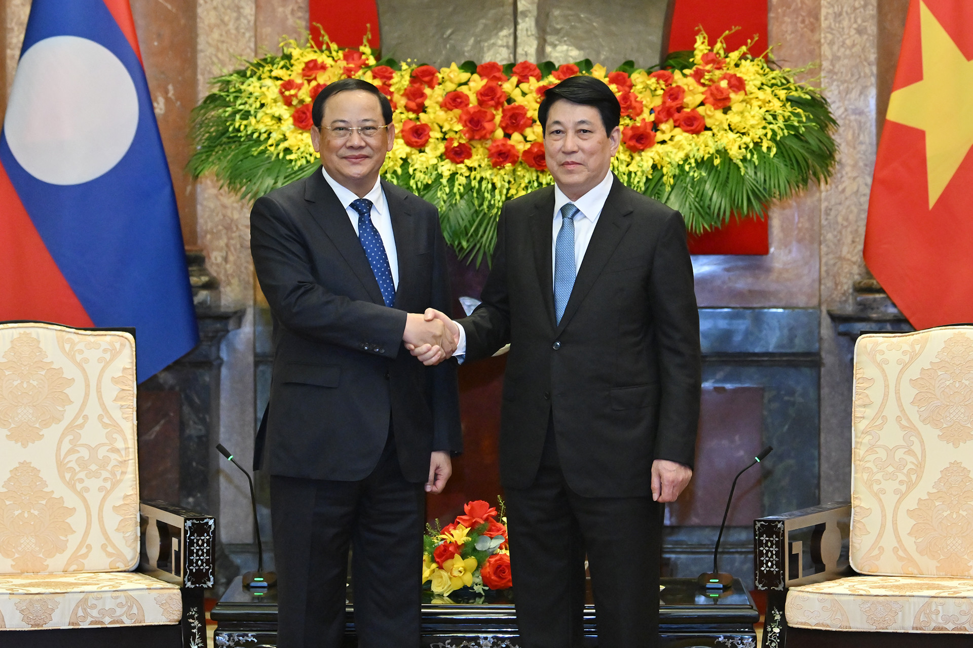 [Ảnh] Chủ tịch nước Lương Cường tiếp Thủ tướng Lào Sonexay Siphandone ảnh 1