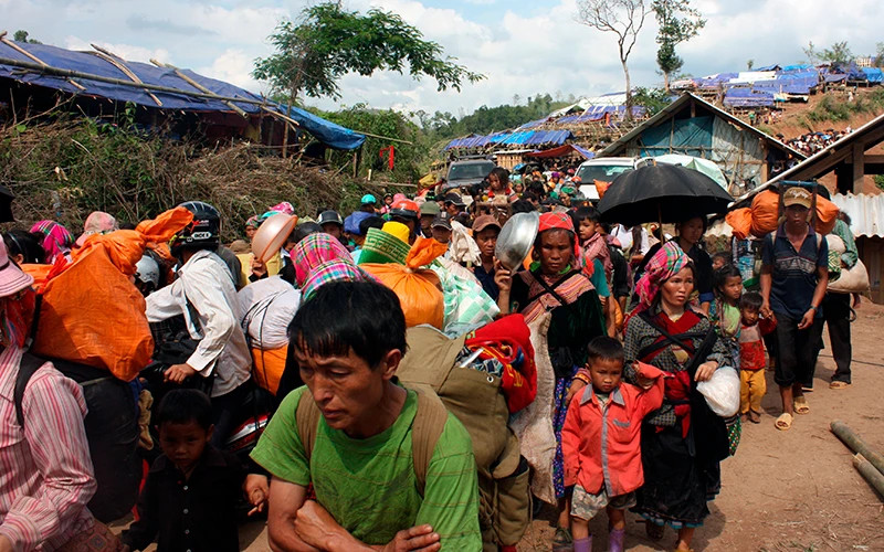 Người dân rời Huổi Khon trở về quê cũ. (Ảnh tư liệu) Người dân rời Huổi Khon trở về quê cũ. (Ảnh tư liệu)