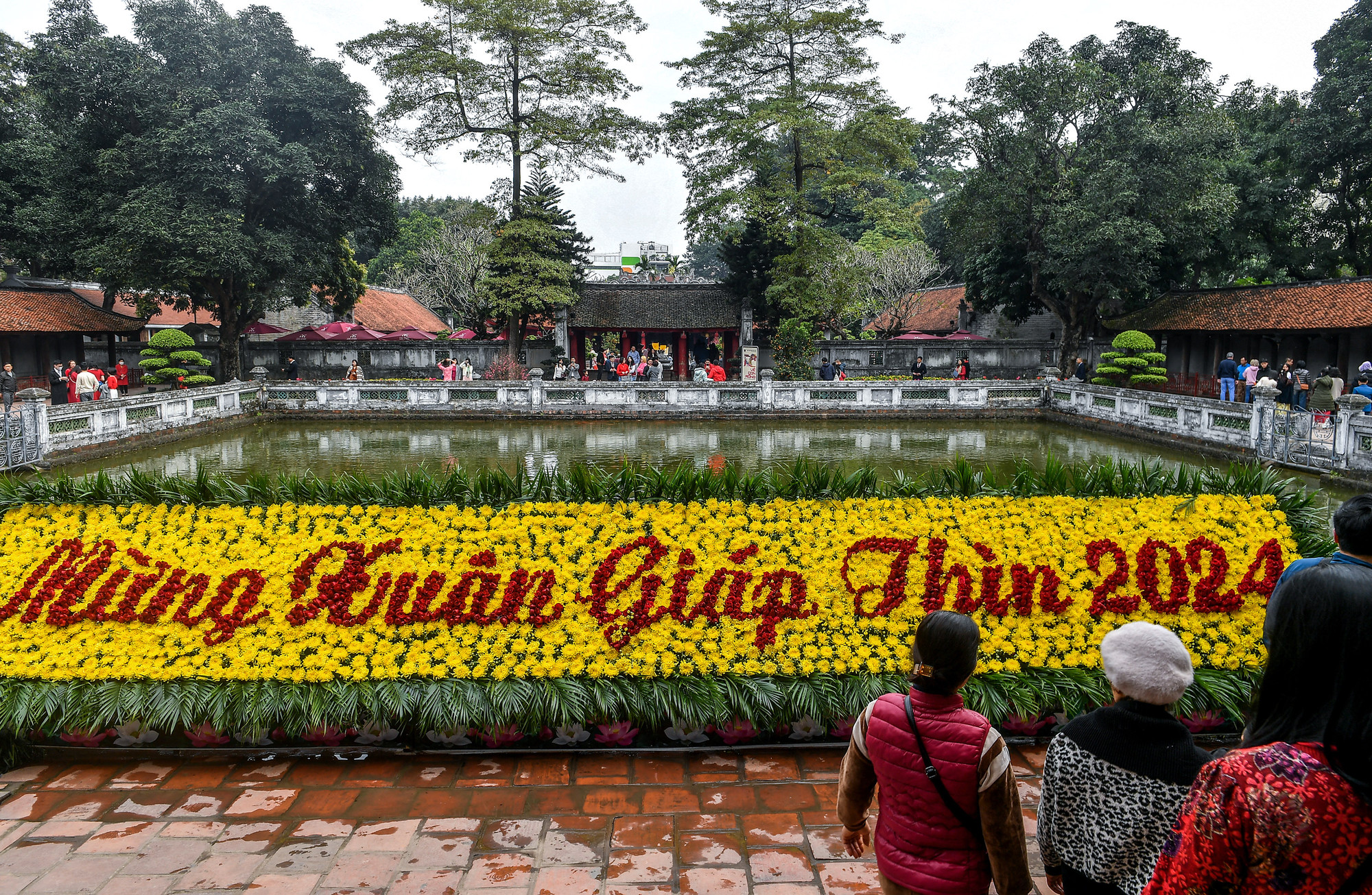 [Ảnh] Người Hà Nội rộn ràng du xuân ảnh 13