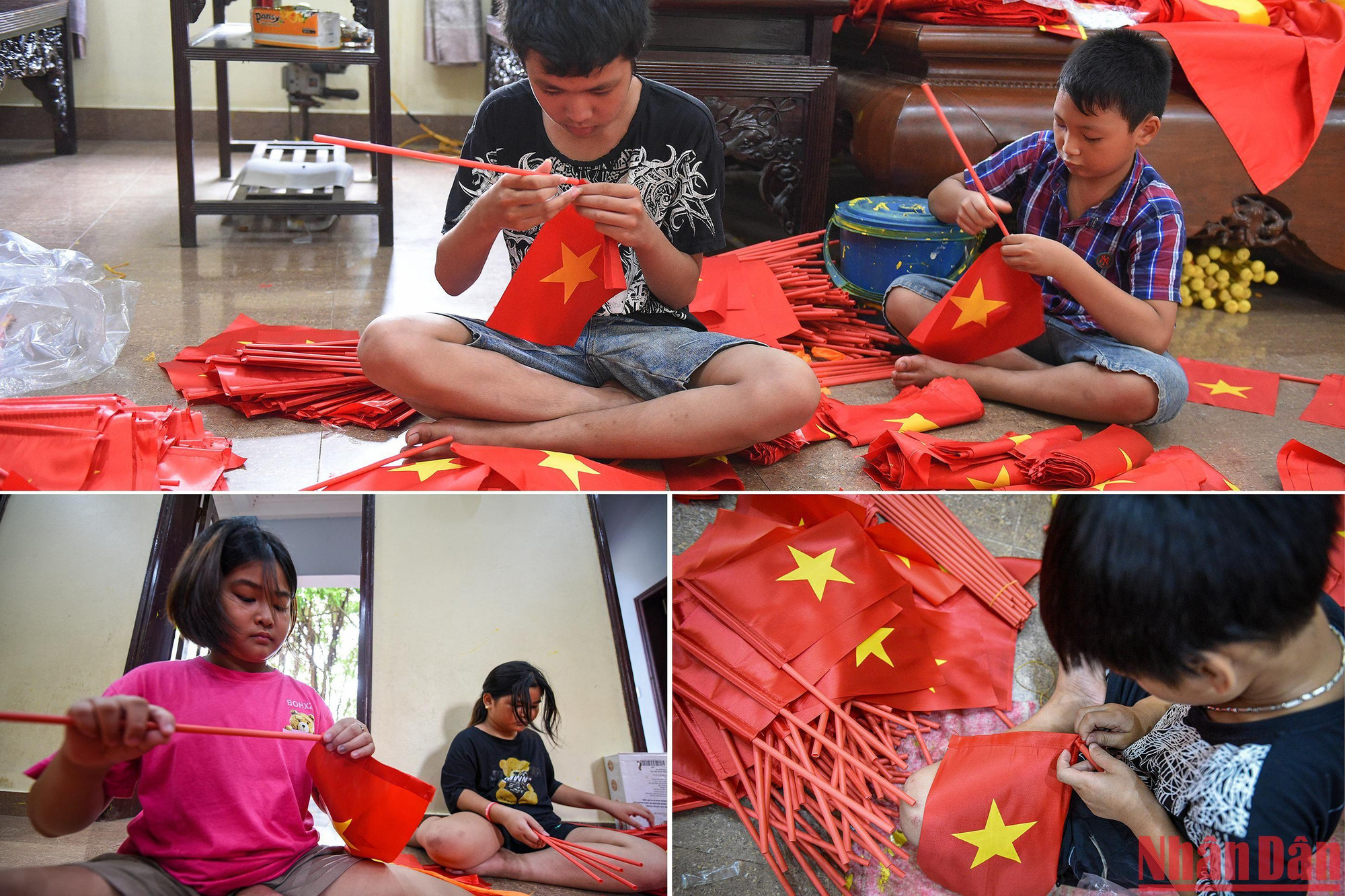 Nhiều em nhỏ tham gia lắp những lá cờ Tổ quốc cầm tay (cờ Tổ quốc nhỏ - loại cầm tay cho học sinh vào năm học mới).
