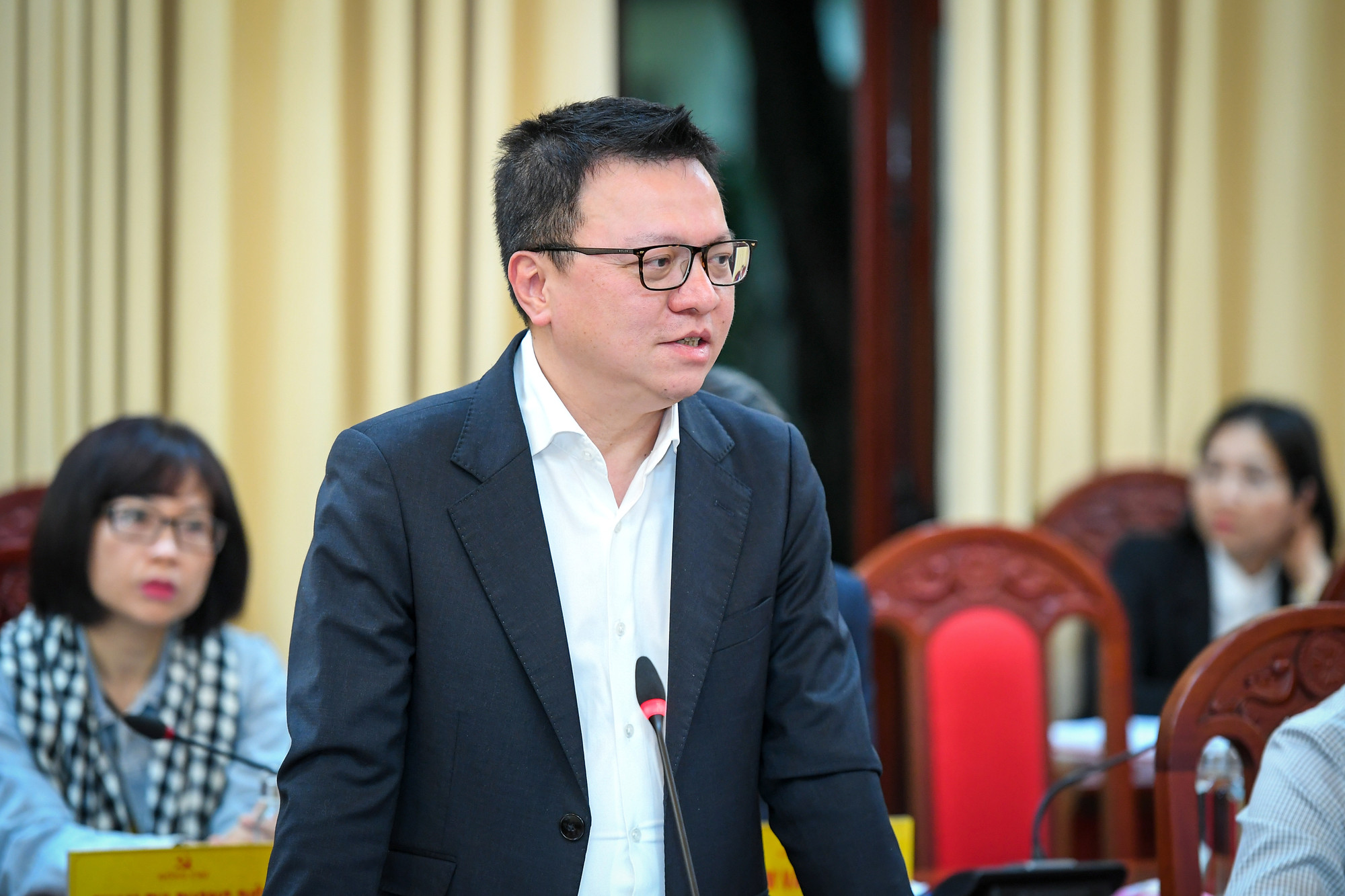 Tổng Biên tập Báo Nhân Dân Lê Quốc Minh phát biểu tại buổi làm việc.