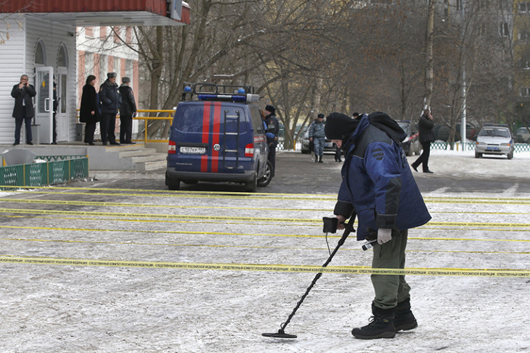 Cảnh sát làm việc tại hiện trường sau một vụ xả súng. Ảnh: Regnum.ru