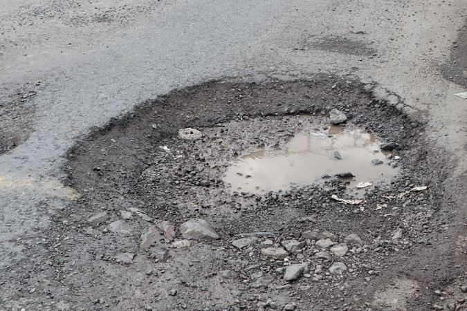Mặt đường hình thành nhiều ổ voi.