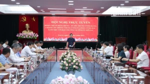 Đồng chí Hoàng Quốc Khánh, Bí thư Tỉnh ủy Sơn La báo cáo tiến độ thực hiện các kết luận, Nghị quyết tại tỉnh Sơn La.