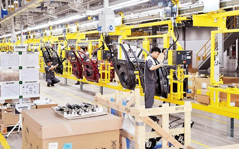 Sản xuất ô-tô tại nhà máy Công ty TNHH Sản xuất và Kinh doanh VinFast, Khu công nghiệp Ðình Vũ (Hải Phòng). (Ảnh: TRẦN HẢI)