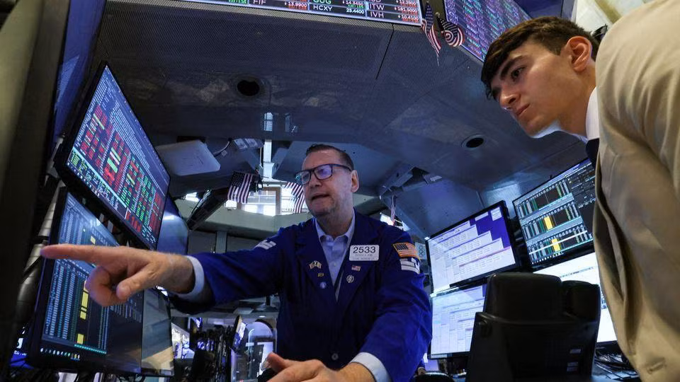 Các nhà giao dịch tại Sàn giao dịch chứng khoán New York, Mỹ, ngày 11/7. (Ảnh: Reuters)