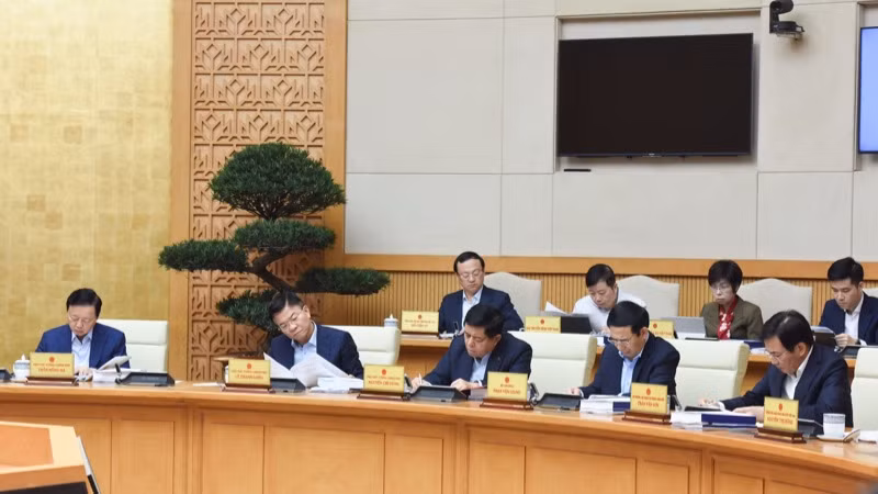 Các thành viên Chính phủ, đại biểu tham dự phiên họp.