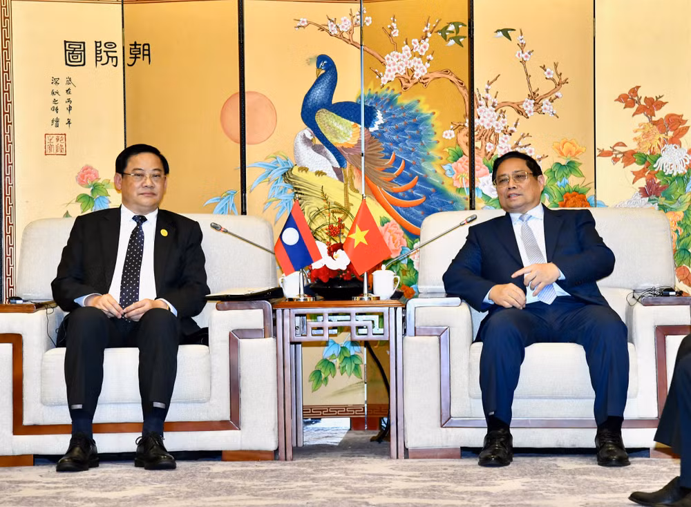 Thủ tướng Phạm Minh Chính tiếp Thủ tướng Lào Sonexay Siphandone (Ảnh: THANH GIANG).