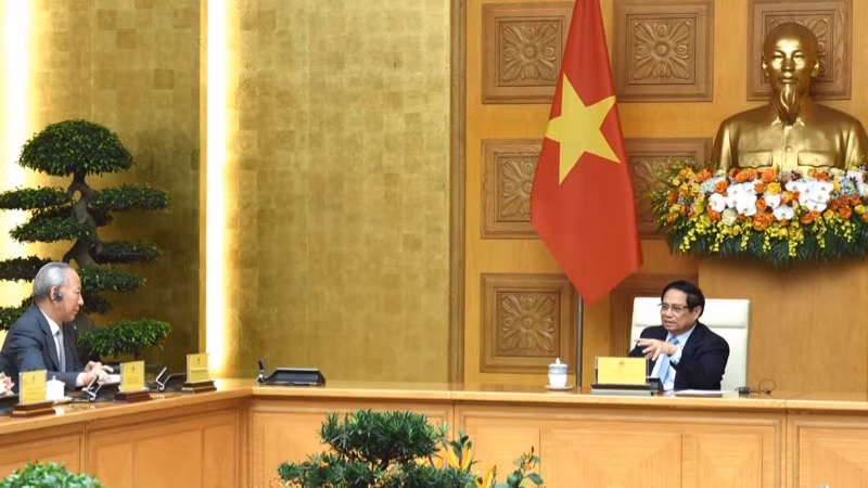 Thủ tướng Phạm Minh Chính và ông Nghiêm Giới Hòa. (Ảnh: Trần Hải)