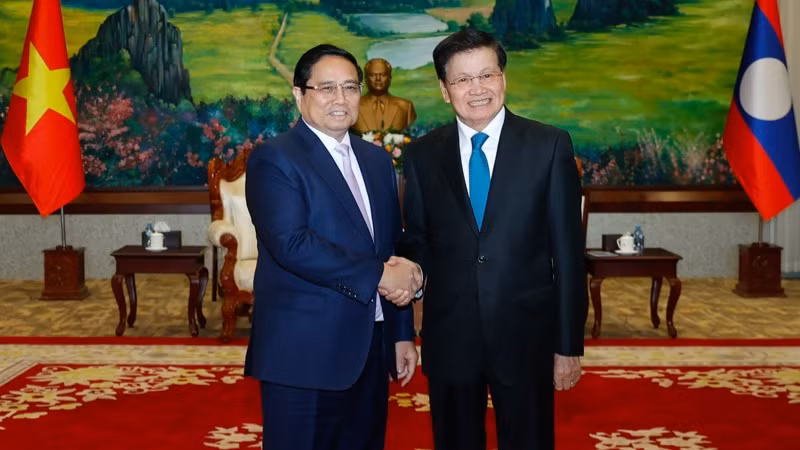 Thủ tướng Phạm Minh Chính và Tổng Bí thư, Chủ tịch nước Lào Thongloun Sisoulith. (Ảnh: THANH GIANG)