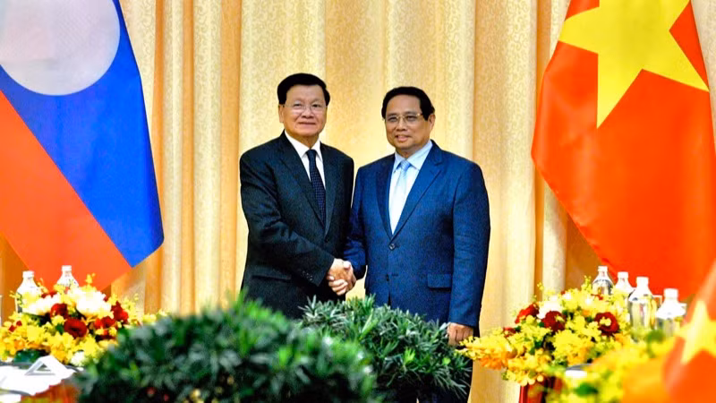 Thủ tướng Chính phủ Phạm Minh Chính và Tổng Bí thư, Chủ tịch nước Lào Thongloun Sisoulith. (Ảnh: THANH GIANG)