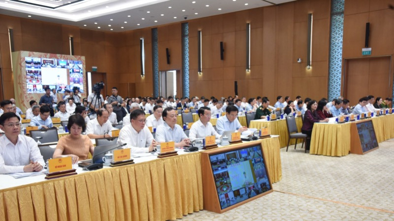 Các đồng chí lãnh đạo, đại biểu tham dự phiên họp. (Ảnh: TRẦN HẢI) Các đồng chí lãnh đạo, đại biểu tham dự phiên họp. (Ảnh: TRẦN HẢI)