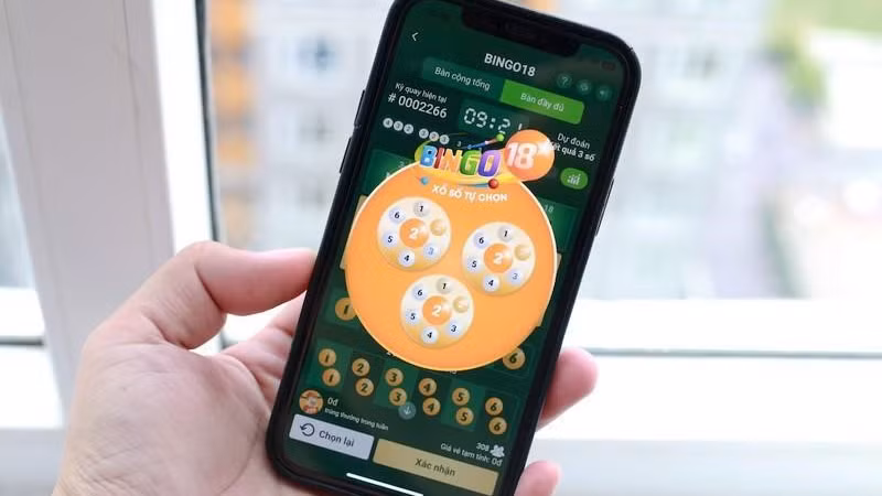 Giao diện quay số mở thưởng của Bingo18 trên Vietlott SMS.