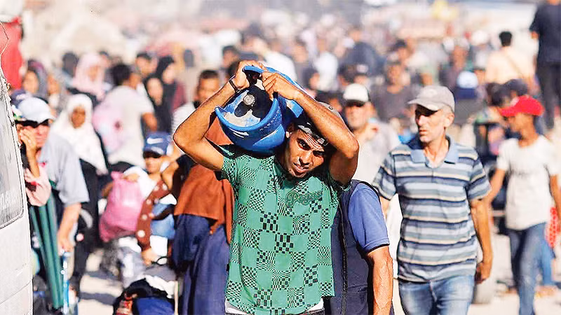 Nhiều người dân Gaza phải sơ tán do xung đột. (Ảnh REUTERS) 