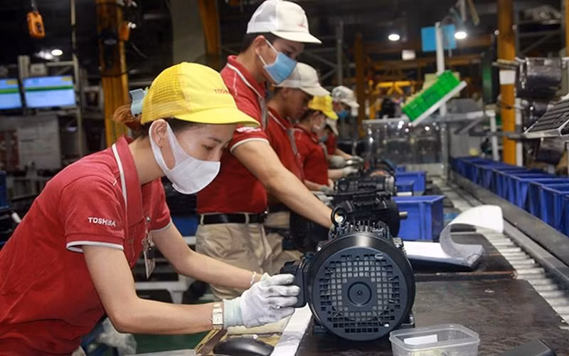 Sản xuất động cơ điện tại một doanh nghiệp ở Khu công nghiệp Amata (Đồng Nai). (Ảnh: LÂM BÌNH và TÂN VƯƠNG)