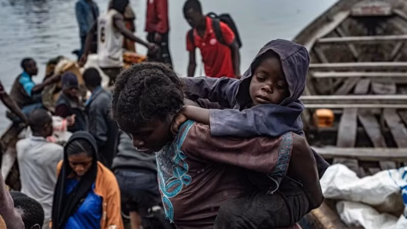 Người dân tị nạn tại tỉnh Bắc Kivu, CHDC Congo ngày 23/1. (Ảnh: THX/TTXVN)