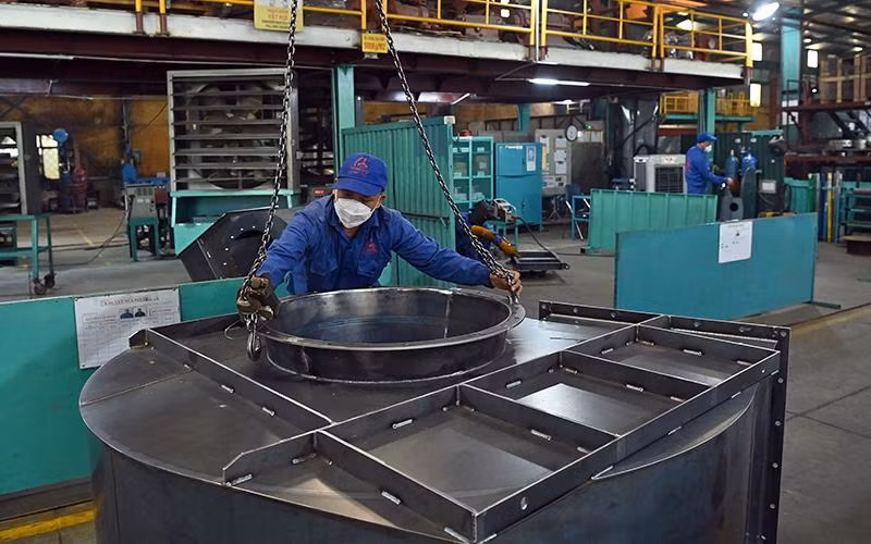 Sản xuất các sản phẩm quạt công nghiệp tại Công ty Tomeco An Khang, cụm công nghiệp Ngọc Liệp, huyện Quốc Oai, Hà Nội. (Ảnh ÐĂNG DUY) 