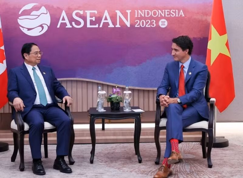 Thủ tướng Chính phủ Phạm Minh Chính và Thủ tướng Canada Justin Trudeau. (Ảnh: NHẬT BẮC)