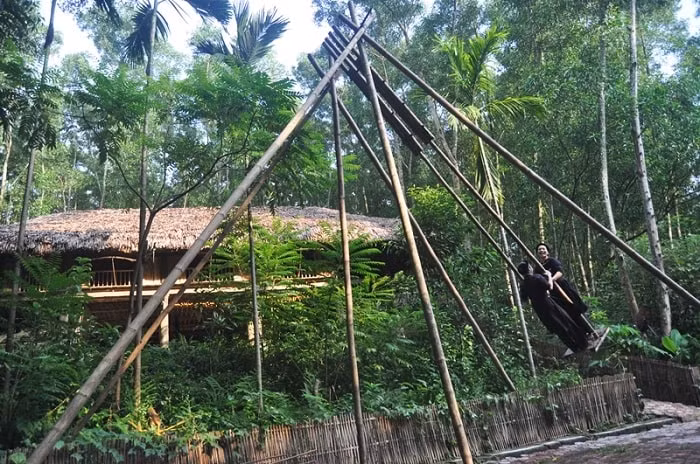 Một góc xanh mát trong Khu bảo tồn Làng nhà sàn Dân tộc sinh thái Thái Hải (Ảnh: thaihai.vn)