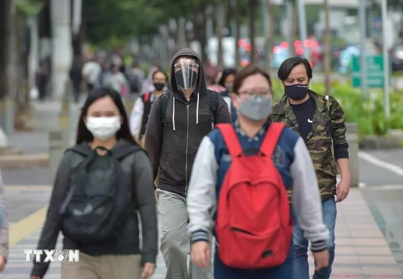 Người dân đeo khẩu trang để phóng HMPV. (Ảnh minh họa từ TTXVN/Xinhua)