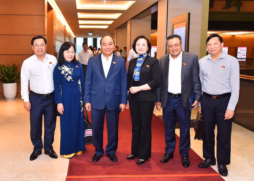 Chủ tịch nước Nguyễn Xuân Phúc cùng các đại biểu Quốc hội tại Phiên chất vấn và trả lời chất vấn chiều 3/11.