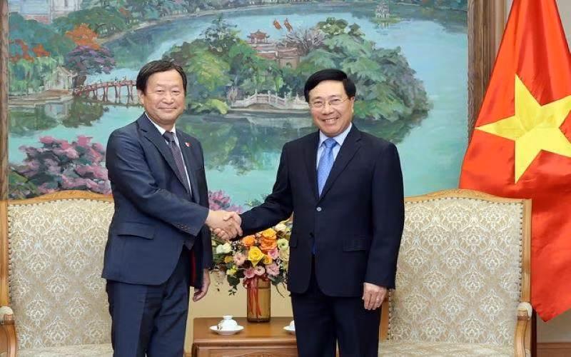 Phó Thủ tướng Thường trực Chính phủ Phạm Bình Minh tiếp Phó Chủ tịch điều hành cấp cao Cơ quan Hợp tác quốc tế Nhật Bản (JICA) Junichi Yamada. Ảnh: VGP
