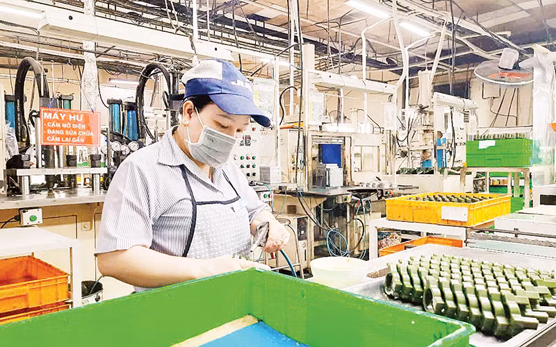 Công nhân Công ty TNHH Juki (Việt Nam) tại Khu chế xuất Tân Thuận, Thành phố Hồ Chí Minh. (Ảnh nhandan.vn)