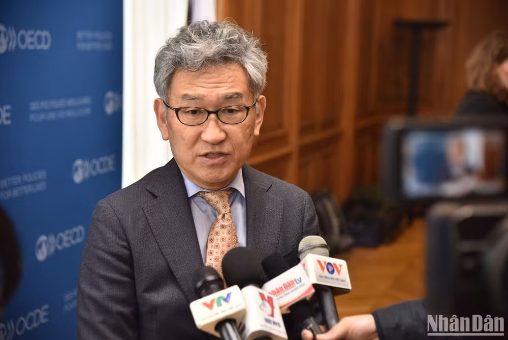 Phó Tổng Thư ký Tổ chức Hợp tác và Phát triển kinh tế (OECD), ông Yoshiki Takeuchi, hoan nghênh nỗ lực của Việt Nam trong hợp tác toàn cầu về thuế. (Ảnh: MINH DUY)