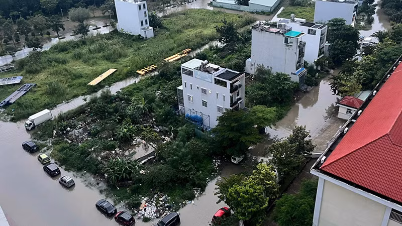 Khung cảnh tại một khu dân cư tại Quận 7 chiều nay. (Ảnh: TTXVN)