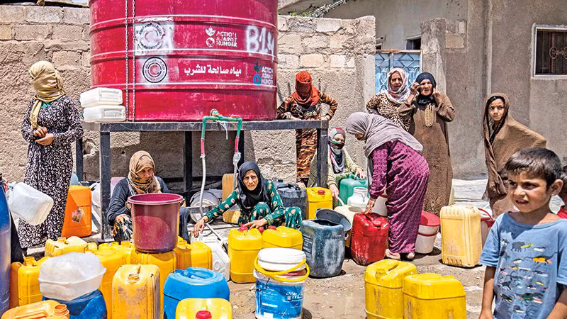 Nhiều người dân Syria phải sống trong cảnh thiếu thốn. (Ảnh THE BUSINESS POST) 