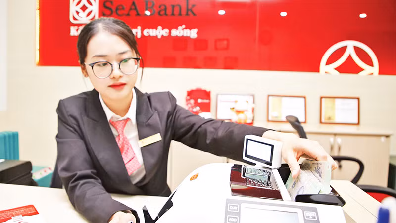 Nhiều ngân hàng thương mại tiếp tục lên kế hoạch tăng vốn điều lệ trong năm 2023, trong đó có SeABank. (Ảnh HUY HƯNG) 