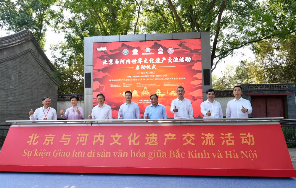 Các đại biểu tại Lễ khai mạc hoạt động nghiên cứu, trao đổi về bảo tồn và phát huy giá trị di sản giữa Hà Nội và Bắc Kinh.