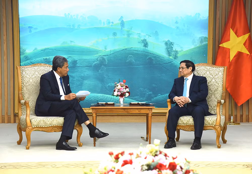 Thủ tướng Phạm Minh Chính tiếp Bộ trưởng Quốc phòng Malaysia Dato’ Seri Utama Haji Mohamad Bin Haji Hasan. (Ảnh: TRẦN HẢI)