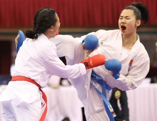 Nữ vận động viên Nguyễn Thị Ngoan (đai xanh) tại Sea Games 31.(Ảnh: Thanh Tùng/TTXVN)