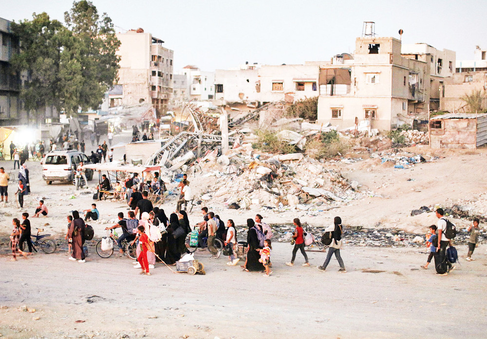 Người dân ở Gaza mất nhà ở do xung đột. 