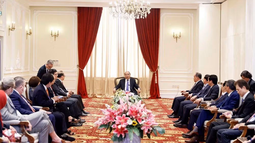 Chủ tịch nước Nguyễn Xuân Phúc gặp gỡ đoàn Hội đồng Tư vấn Kinh doanh APEC do ông Kriengkrai Thiennukul, Chủ tịch Hội đồng dẫn đầu. (Ảnh: Thống Nhất/TTXVN)