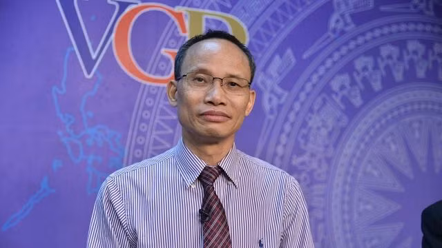 Tiến sĩ Cấn Văn Lực, Chuyên gia kinh tế trưởng Ngân hàng BIDV, thành viên Hội đồng Tư vấn chính sách tài chính-tiền tệ Quốc gia tại buổi Toạ đàm. (Ảnh: VGP)