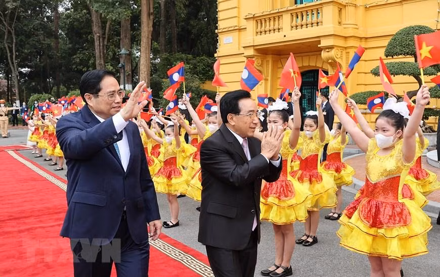 Thủ tướng Phạm Minh Chính chủ trì lễ đón Thủ tướng Lào Phankham Viphavanh thăm chính thức Việt Nam, tháng 1/2022. Ảnh: TTXVN