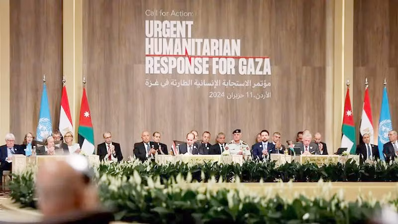 Phiên toàn thể Hội nghị viện trợ khẩn cấp cho Gaza diễn ra tại Jordan. (Ảnh REUTERS)