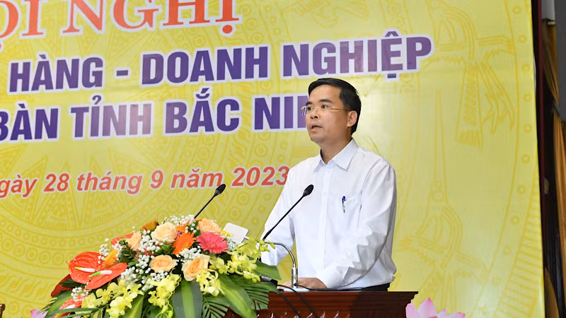 Ông Nguyễn Xuân Bắc báo cáo tại Hội nghị.