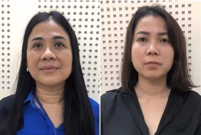 Giám đốc Xuyên Việt Oil Mai Thị Hồng Hạnh (trái) và Phó Giám đốc Nguyễn Thị Như Phương. (Ảnh: Công an cung cấp)
