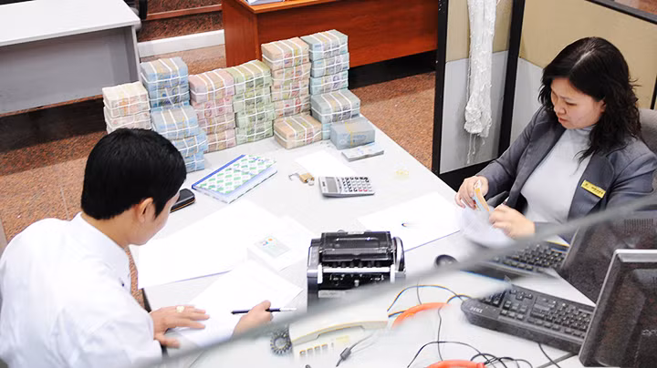 Các doanh nghiệp vẫn khó tiếp cận nguồn vốn ngân hàng. Ảnh: NGUYỆT ANH